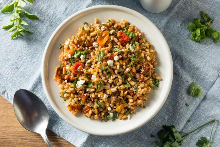 A farro salad with tomatoes, herbs and feta