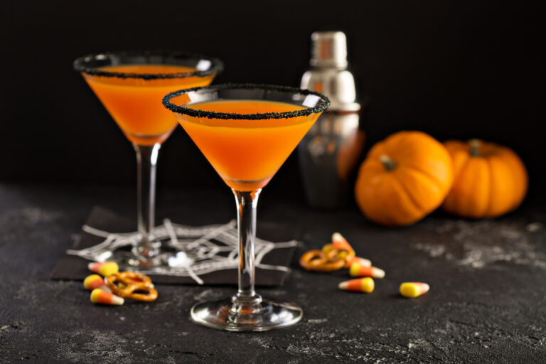 A pumpkin martini with a black sea salt rim